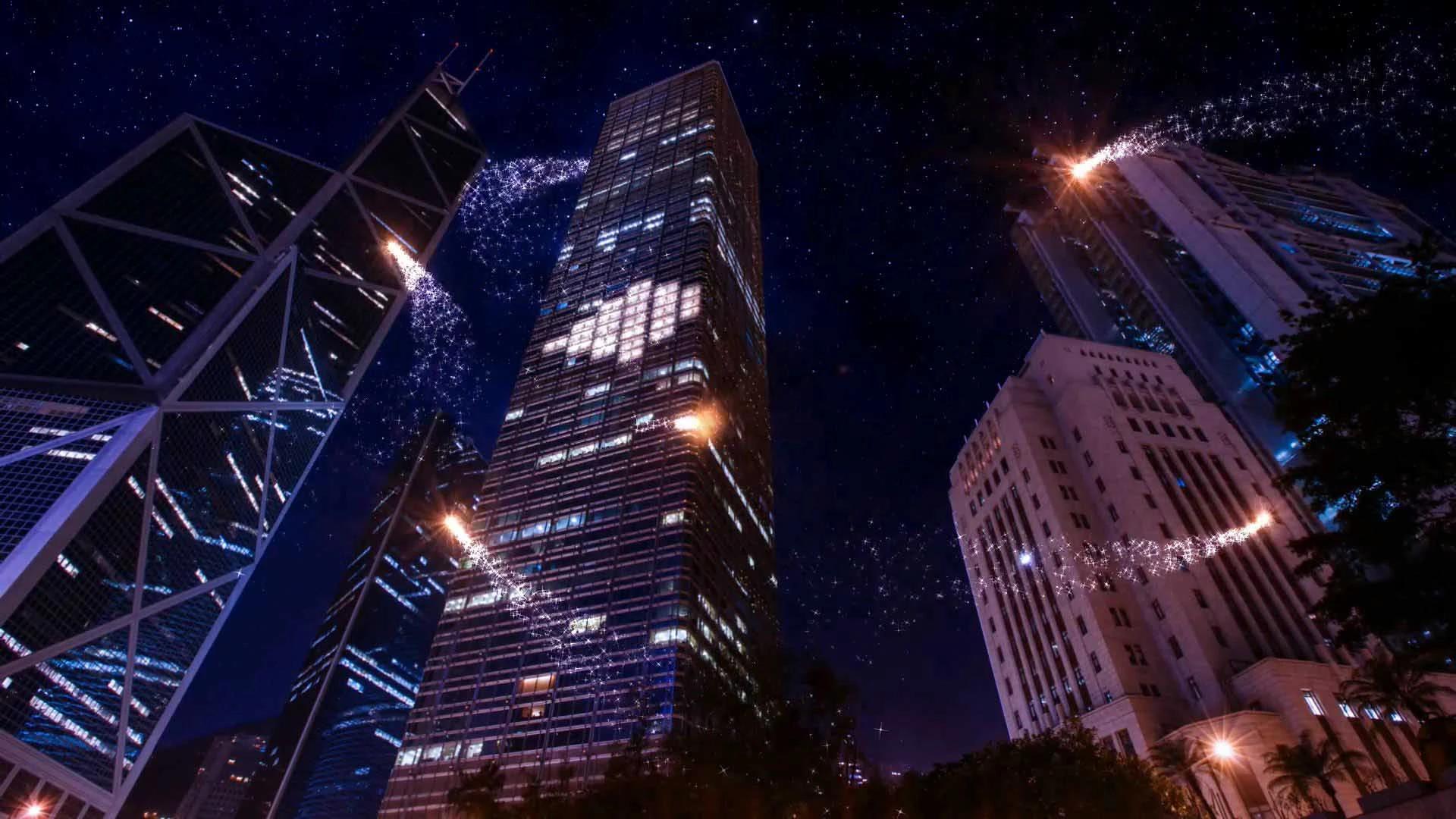 Animated sparks of light fly towards the Hong Kong scyscrapers.