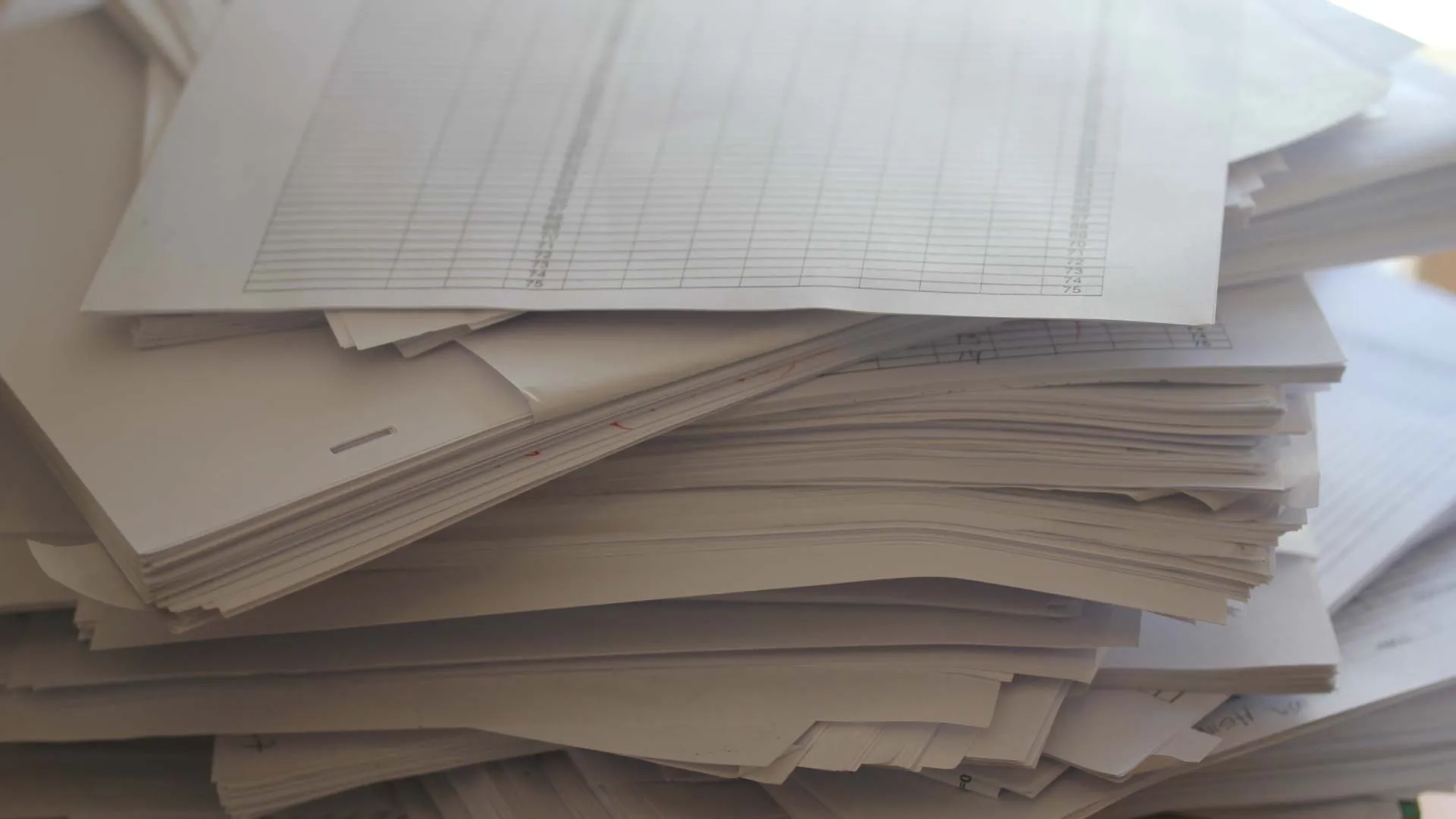 Large pile of had drawn aniamtion frames in animation studio