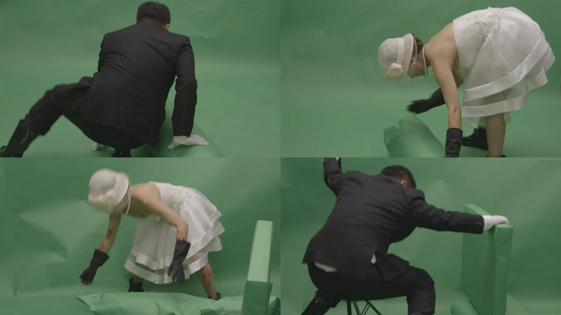 A bride and groom acting in front of a green screen.