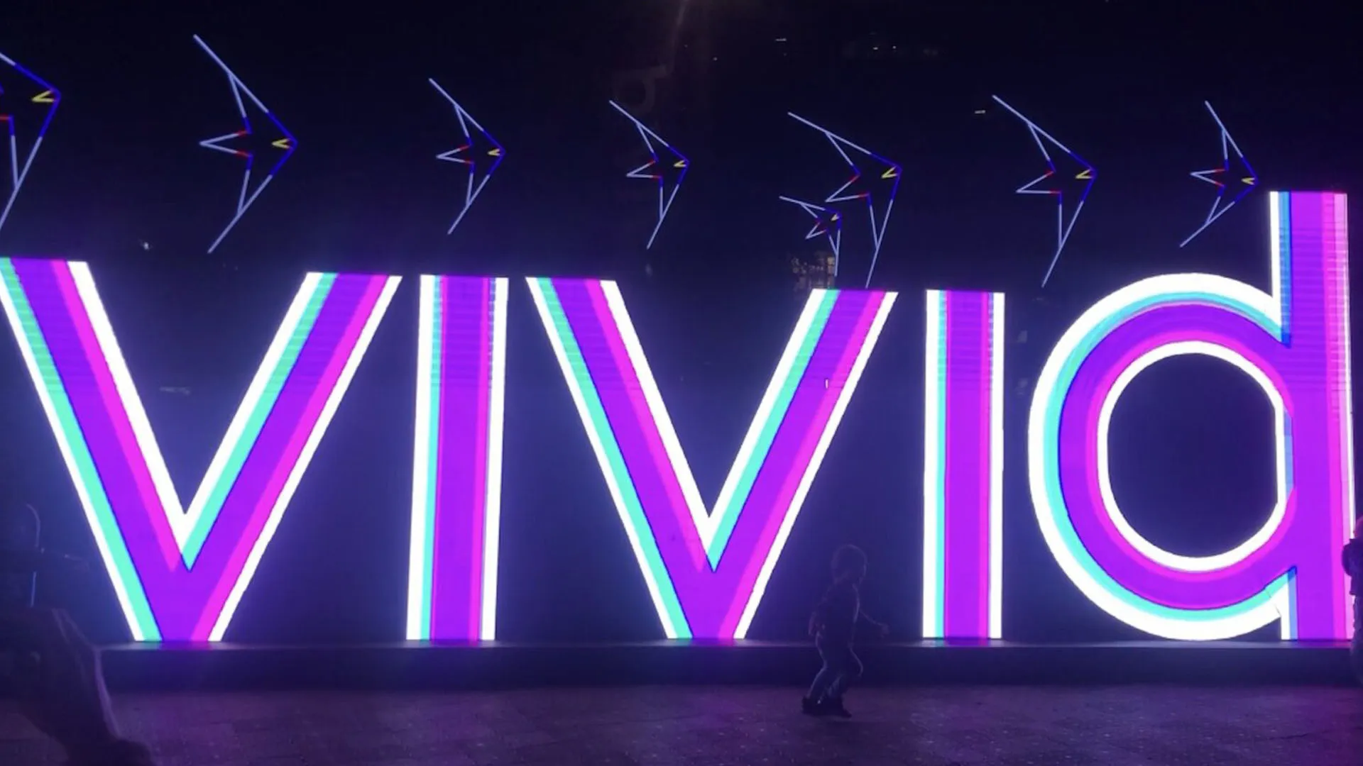 A giant Vivid Sydney signage in First Fleet Park