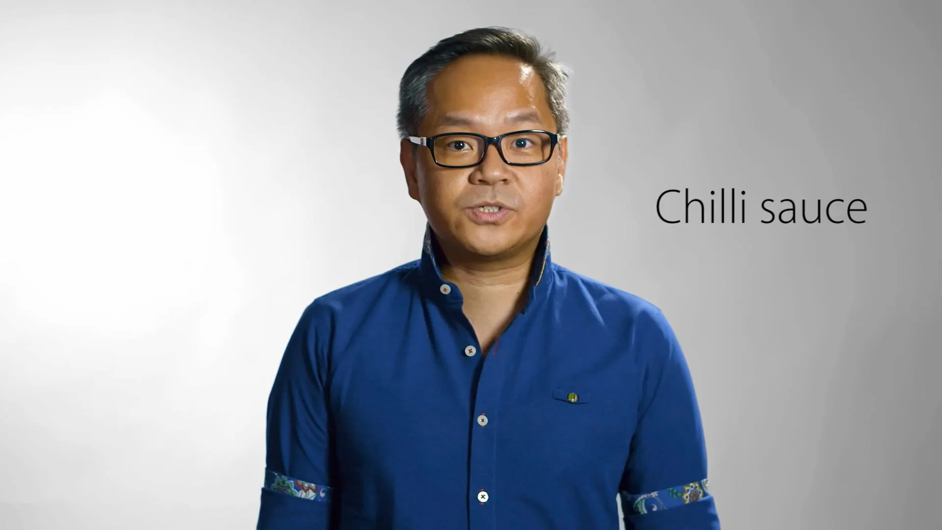 A man saying chilli Sauce
